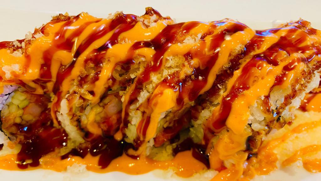 Crunch Roll · Spicy tuna, crab, cucumber, topping crunch, spicy mayo, eel sauce.