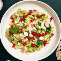Pesto Possibility Mac  · Tender chicken, creamy pesto, sun-dried tomatoes, and spinach cooked in a blend of creamy ch...