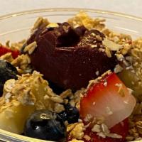 Acai Bowl · Pure acai topped with strawberries, blueberries, banana and granola.