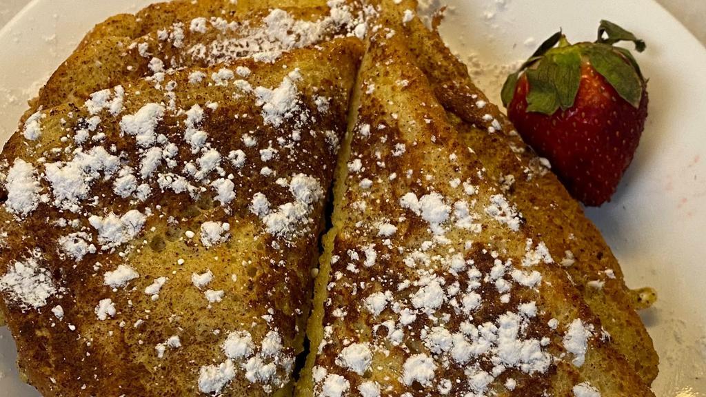 French Toast · 3 slices of cinnamon and vanilla French toast served with butter and syrup.