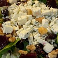 Sweet Beet Salad · Mixed greens, beets, craisins, walnuts, gorgonzola cheese with raspberry vinaigrette.