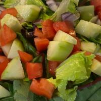 Garden Salad · Mixed greens, cucumber, tomato, red onion, your choice of dressing.