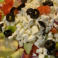 Greek Salad · Iceberg lettuce, feta cheese, tomato, cucumber, olives, red onion with Greek dressing.