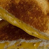 Grilled Cheese Classic Sandwiches · Melted American cheese grilled on white bread.