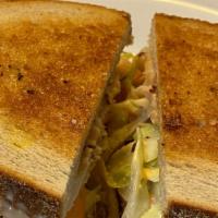 Turkey Rubin Classic Sandwiches · Turkey and Swiss with coleslaw and Russian dressing grilled on rye bread.