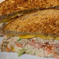 Tuna Melt Classic Sandwiches · Tuna salad, melted American cheese and tomato on toasted multigrain bread.