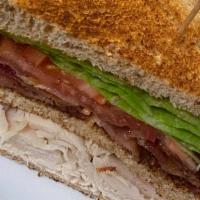 Turkey Club Classic Sandwiches · Turkey, bacon, lettuce and tomato on triple layer white toast with mayo.