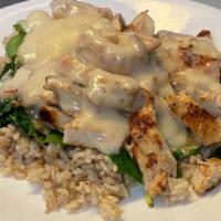 Chicken Melt · Grilled chicken topped with sautéed spinach and melted Swiss over brown rice.