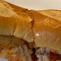Chicken Parmigiana · Chicken cutlet, tomato sauce, melted mozzarella and Parmesan cheese on a club roll.