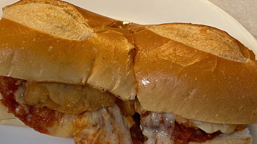 Chicken Parmigiana · Chicken cutlet, tomato sauce, melted mozzarella and Parmesan cheese on a club roll.