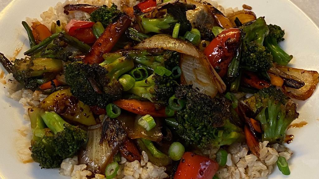 Stir Fry · Stir fry veggies with your choice of chicken, or vegetarian over brown rice.