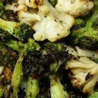 Roasted Broccoli & Cauliflower · Oven roasted broccoli and cauliflower served on the side or in a 1/2 lb container.