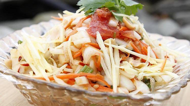 A3 - Green Papaya Salad · Shredded green papaya with crushed chili, garlic, lime, carrot, tomato and roasted peanut in a tangy sauce.