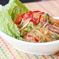 A6 - Glass Noodle Salad · Glass noodle prepared in North Eastern Thai (Isaan) style with roasted rice powder, chili fl...