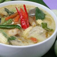 E2 - Green Curry · Slightly sweet and spicy curry with Thai eggplant, green bean, bell pepper, carrot, kaffir l...