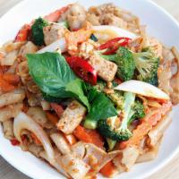 Pad Kee Mao (Drunken Noodles) · Wide noodles with broccoli, carrot, onion, garlic, bell pepper, Thai basil, chili and black ...