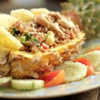F2 - Fried Rice With Pineapple · Thai style fried rice, carrot, garlic, onion, broccoli, mushroom, celery, cashew nuts and ch...