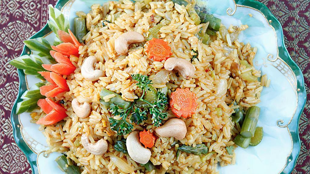 F1 - Fried Rice With Mixed Vegetables · Thai style fried rice, carrot, onion, garlic, tomato, cabbage, mushroom, cauliflower, broccoli and kale. Topped with sesame seeds and cashew nuts. Gluten free.