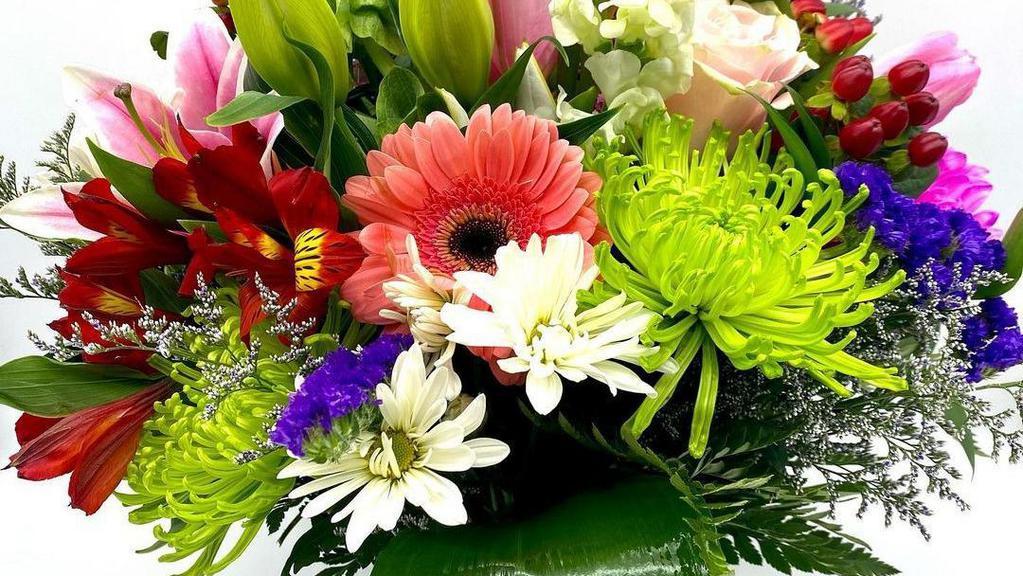 Patriotic Memorial · Includes acrylic urn container, foliage: sword fern, eucalyptus, teepee, blue delphinium, white gladiolus, red carnations, white Fuji mums.