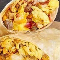 Meat Lover’S Breakfast Burrito  · Scrambled eggs, bacon, sausage, ham, mushroom, breakfast potatoes and cheese (choice) wrappe...
