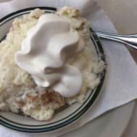 Creamy Rice Pudding · Served with whipped cream.