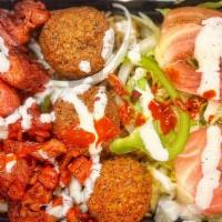 Combo/Mix Over Rice (2) · Comes With Aromatic Basmati Rice, Falafel and Grilled Chicken/Lamb, Grilled Onion, Green pep...