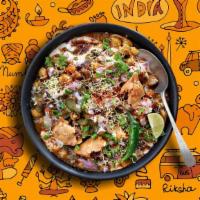 Deconstructed Chaat Samosa  · Classic samosas, crushed and mixed with hot, sweet and tangy sauces, yogurt and topped with ...