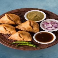 Samosa Samurai 2 · Triangle shaped deep fried pastry dumplings filled with spiced potatoes and vegetables