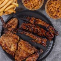 Family Pack 2 · 4 pieces chicken , 3 pieces of BBQ ribs, served with large side of rice and one large side o...