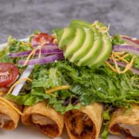 Flautas Supremas · Four fried Mexican tortilla rolled-up, filled with protein of your choice, served with fresh...