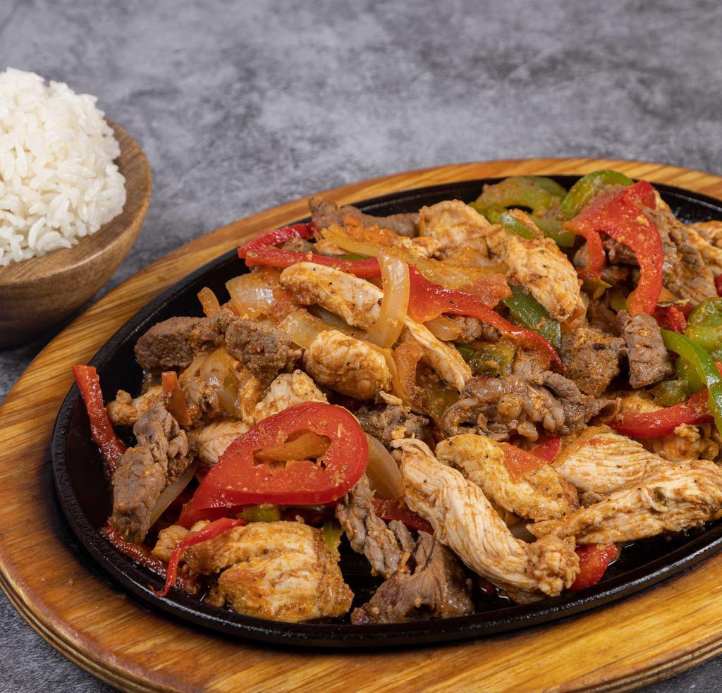 Fajitas Suprema · Sautéed onion, red bell pepper, green bell pepper with the protein of your choice, served with two regular sides.