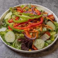 House Salad · Lettuce, cucumber, tomato, corn, carrots with dressing of your choice.