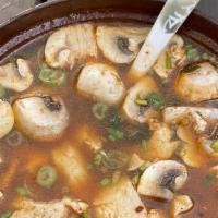 Tom Yum Soup · Spicy.  Lemongrass, lime leaves, onion, mushroom and chili paste