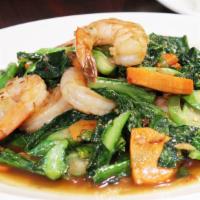 Pad Kana Over Rice · Stir fried Chinese broccoli over rice with chili and garlic