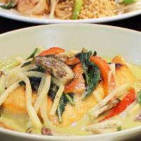 Green Curry · Bamboo shoot, bell pepper, basil leaves in coconut milk.