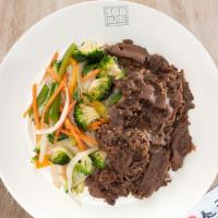 Beef Bulgogi · Classic Korean BBQ sliced sirloin marinated in our house sauce with stir-fried vegetables ov...