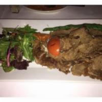 Doner · Marinated lamb served thinly sliced with grilled tomatoes and peppers.