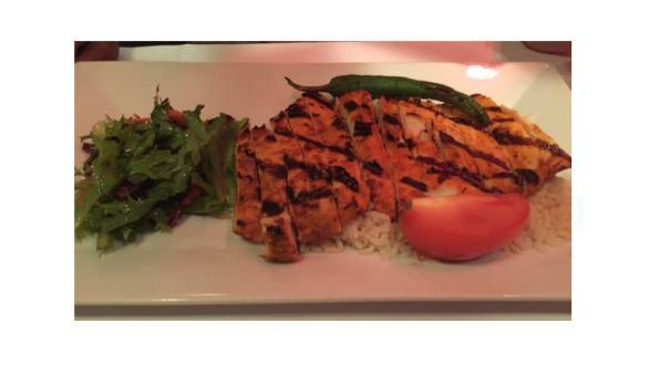 Grilled Chicken Doner · Marinated grilled chicken breast served with grilled tomatoes and peppers.