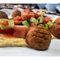 Falafel Plate · Served with Jerusalem salad, rice and tahini sauce.