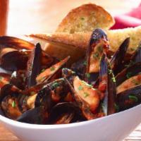 Mussels Marinara · A pound of mussels sauteed in marinara sauce and served with garlic bread.