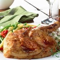 Half Roasted Chicken · A half bone-in anti-biotic free chicken roasted with garlic and herbs. Served with garlic ma...