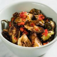 Brussels Sprouts · Crispy with chili honey and pickled fresnos.