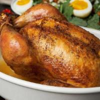 Roast Chicken · Whole roasted Amish chicken with golden skin and tender meat.   *Contains dairy.