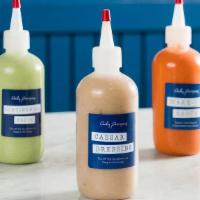 Bottle Of Caesar Dressing · 8 oz bottle of our Caesar dressing - try it on salads, steamed vegetables, and poached fish....