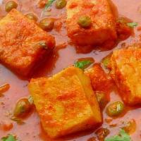 Matar Paneer · Cheese cooked with peas, Onions, in a tomato sauce.