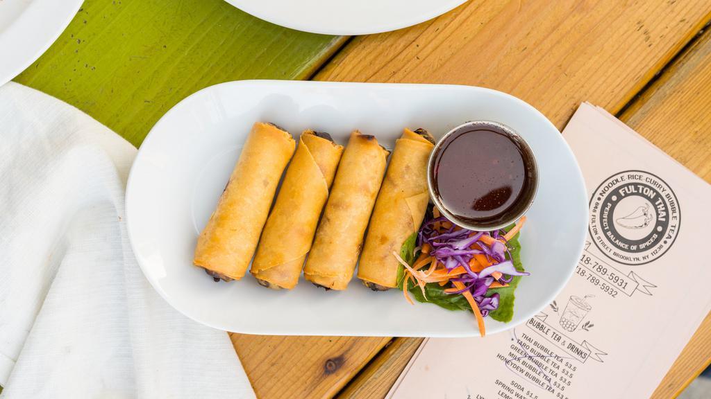 Spring Rolls · Vegetables and glass noodles wrapped in rice sheet. Served with sweet plum sauce.
