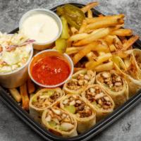 Shawarma Arabi · Syrian style chicken Shawarma wrapped with garlic whip and pickles, then pressed toasted and...