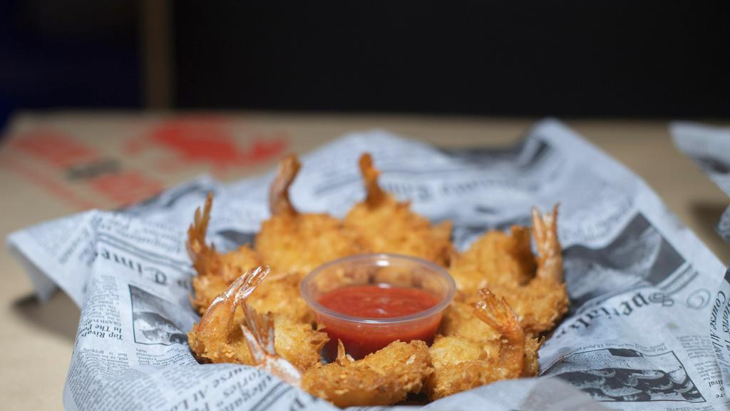 Coconut Shrimp · Bread Coconut Shrimp served with a sweet chili sauce on the side