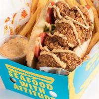 Catfish Po' Boy · Catfish lovers be warned: you won't be able to eat just one. Served with crispy lettuce, tom...