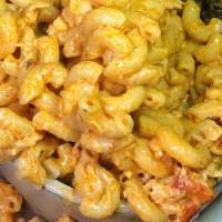Lobster Mac & Cheese · Served with lobster and Parmesan cheese.